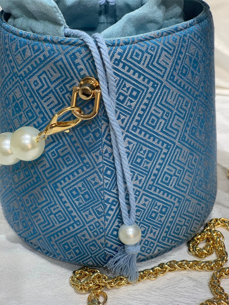 Handmade Zhuang Brocade Bunny-Ear Bucket Bag | Artisan-Crafted Ethnic Crossbody Bag with Pearl Accent