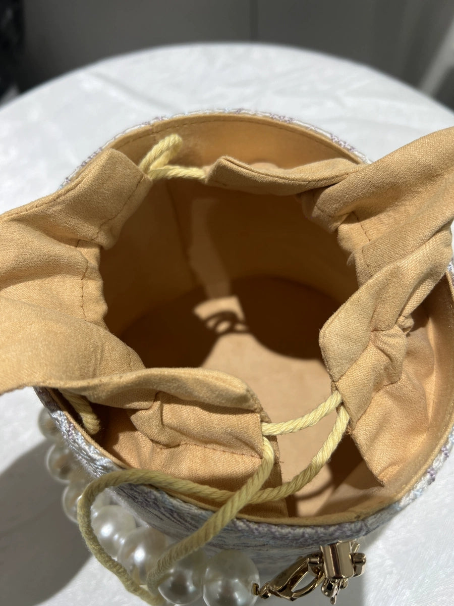 Handmade Zhuang Brocade Bunny-Ear Bucket Bag | Artisan-Crafted Ethnic Crossbody Bag with Pearl Accent