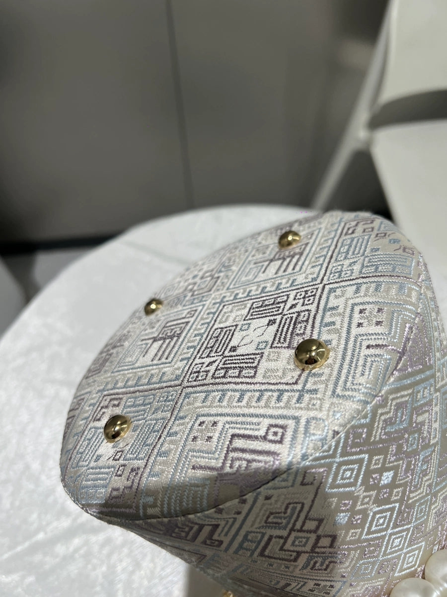 Handmade Zhuang Brocade Bunny-Ear Bucket Bag | Artisan-Crafted Ethnic Crossbody Bag with Pearl Accent