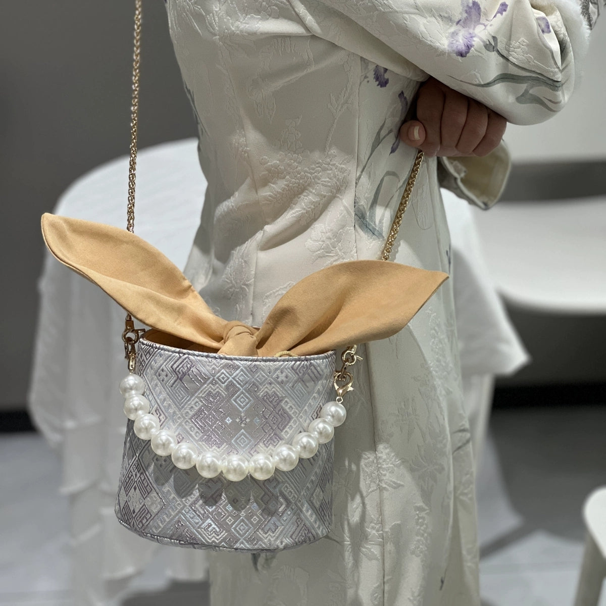 Handmade Zhuang Brocade Bunny-Ear Bucket Bag | Artisan-Crafted Ethnic Crossbody Bag with Pearl Accent